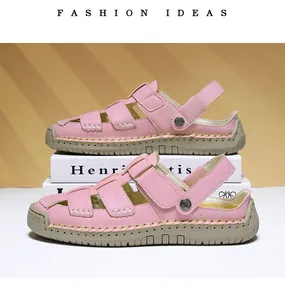 Side view of pink women's casual sandals stacked on decorative books in a studio setting.