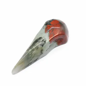 Macro view of natural stone bird skull carving with unique jasper patterns