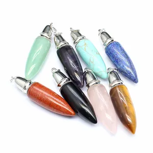 Variety of colorful natural stone bullet-shaped pendants in different crystal types.
