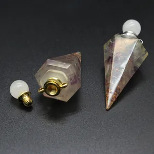 Detailed view of resin hexagonal pyramid perfume bottle with crushed amethyst stones