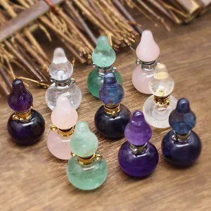 Detailed macro shot of natural stone gourd perfume bottle pendants in various crystal colors