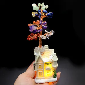 Handmade seven chakra crystal money tree with a warm glowing house base ornament