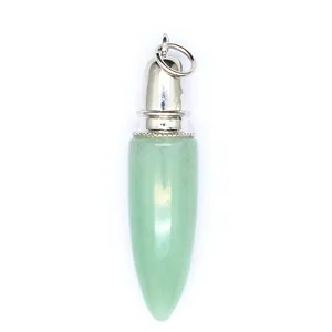 Detailed view of a green natural stone bullet-shaped pendant with silver metal cap