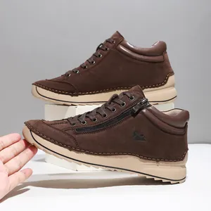 Side view of handmade brown suede casual shoes for women with side zipper details