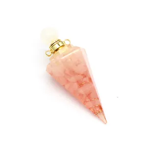 Detailed view of hexagonal resin cone filled with pink tourmaline and copper coil