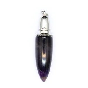 Close-up detail of dark purple amethyst bullet shaped pendant with silver metal cap