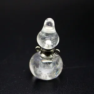Macro view of the natural internal texture of a clear crystal gourd-shaped perfume bottle pendant