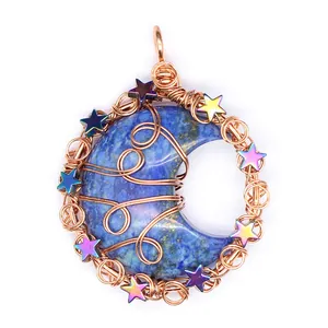 Detailed view of handmade wire-wrapped moon pendant with lapis lazuli and colorful stars