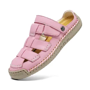 Fashionable pink women's summer sandals semi-mules with adjustable straps and rubber sole