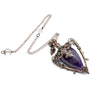 Vintage amethyst pendulum pendant necklace with ornate bronze thorns frame detail