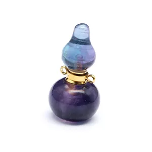 Close-up detail of a handcrafted gourd-shaped natural fluorite stone perfume bottle necklace pendant
