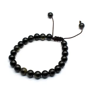 Close-up detail of 8mm natural black obsidian stone beads and durable brown woven cord
