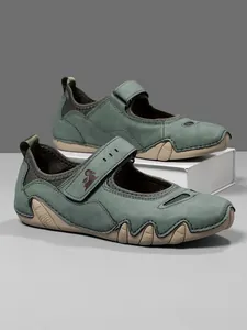 Comfortable green Mary Jane walking shoes for women featuring adjustable Velcro strap design