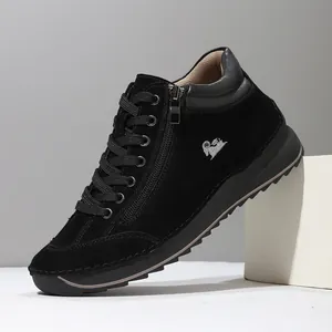 Detailed side view of black suede casual women's shoes with zipper and white logo