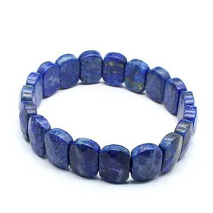 Close-up detail of a faceted natural lapis lazuli stone bracelet with unique blue texture