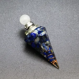 Macro view of a hexagonal resin cone pendant featuring blue stones and copper wire