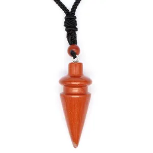 Detailed view of a conical red jasper crystal pendant with natural stone patterns.