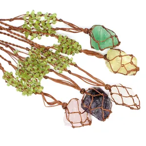 Detailed view of assorted raw natural crystal stones in hand-woven bohemian net bags