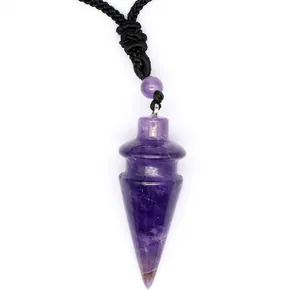 Detailed macro view of a cone-shaped purple amethyst crystal pendant with black cord