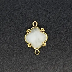 Close-up of 18K gold plated moonstone flower pendant with double loops for DIY jewelry