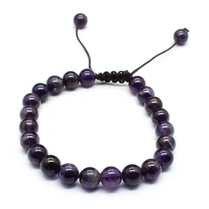 Close-up of 8mm amethyst stone bead bracelet with adjustable handmade braided cord