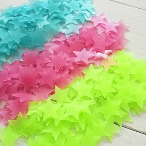 Close-up of colorful glow-in-the-dark 3D plastic star stickers for wall decor
