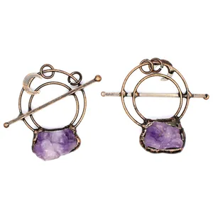 Detailed view of medieval retro amethyst pendants with antique bronze moon frames