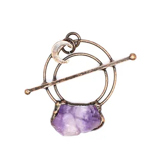 Vintage bronze pendant with natural purple amethyst crystal stone detail