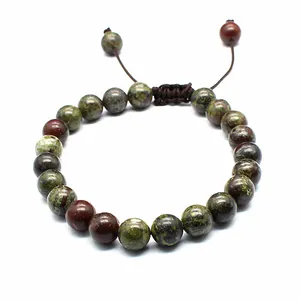Detailed view of handmade 8mm natural stone beaded bracelet with adjustable cord