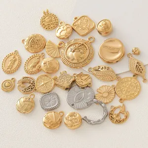 Macro view of assorted 18K gold plated stainless steel pendants with diverse motifs