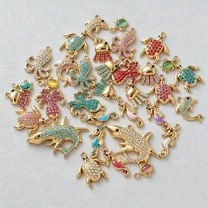 Assorted gold plated ocean animal charms featuring colorful rhinestones for DIY jewelry
