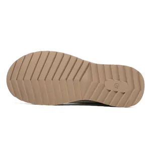 Detailed view of the anti-slip grooved rubber sole of flat women's casual shoes