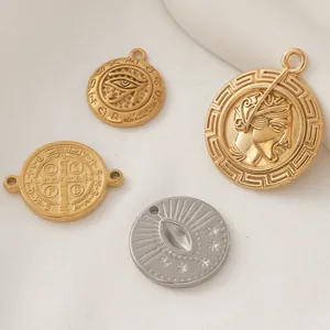 Detail view of assorted stainless steel gold-plated charms for jewelry DIY