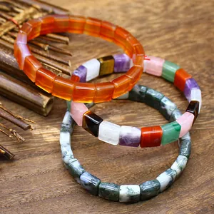Close-up of square faceted natural stone bracelets in various crystal colors