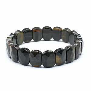 Detailed macro view of faceted rectangular natural tiger eye stone bracelet beads