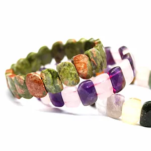 Macro detail of faceted natural crystal stone bracelets with unique textures and colors