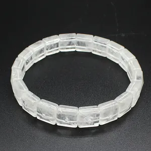 Detail shot of a minimalist square-cut clear crystal bracelet with natural texture