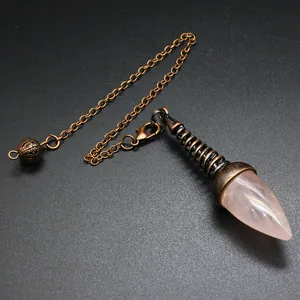 Detailed view of a rose quartz crystal dowsing pendulum with antique bronze chain.
