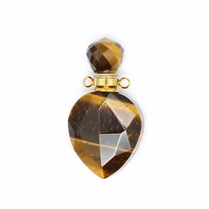 Detailed view of natural teardrop faceted tiger eye stone perfume bottle pendant necklace.