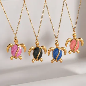 Gold-plated stainless steel sea turtle pendant necklaces in four colorful enamel shades.