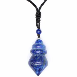 Close-up of conical lapis lazuli crystal pendant with black braided rope cord