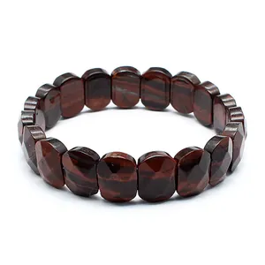 Macro view of faceted natural red tiger eye stone bracelet showing distinct texture