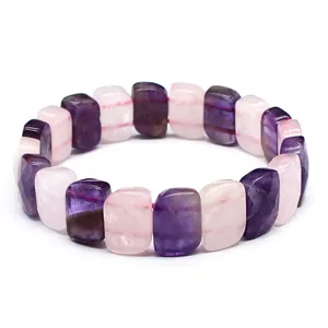 Macro detail of faceted amethyst and rose quartz crystal hand row bracelet jewelry