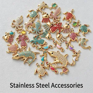 Assorted gold-plated stainless steel marine animal charms with vibrant colorful zirconia