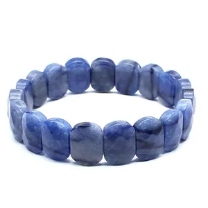 Detailed macro shot of a faceted natural blue stone bracelet showing stone texture