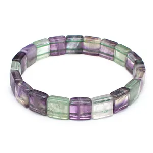 Close-up of a square faceted natural fluorite crystal bead bracelet on white background