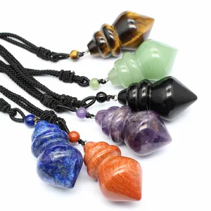 Various spiral conical natural crystal gemstone pendants including amethyst and obsidian