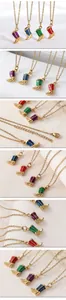 Close-up details of vintage stainless steel cowboy boot pendant necklaces in various colors.