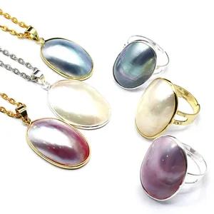 Macro detail of natural Mabe pearl necklace and ring jewelry set with elegant iridescent luster