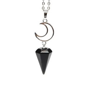 Detailed view of a silver moon necklace featuring a black hexagonal stone pendant